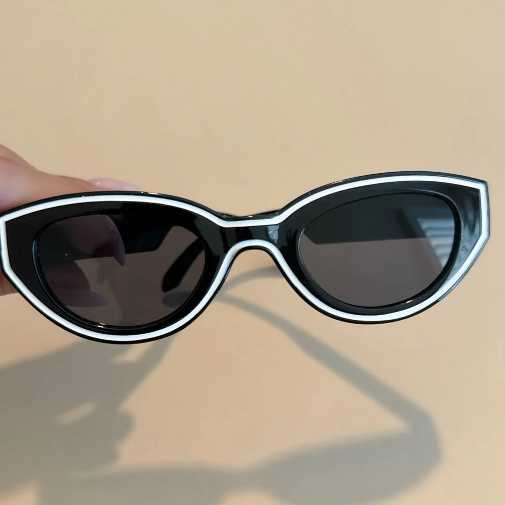 REVOLVE Black and White Cat Eye Sunglasses